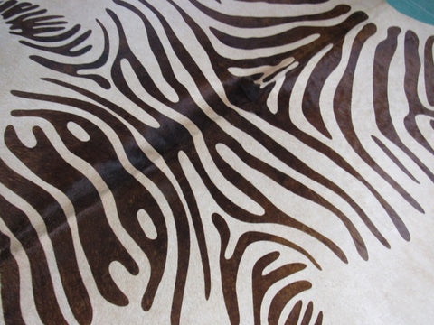 Zebra Print Cowhide Rug with Brown Stripes (1 hard to see patch, 1 scratch) Size: 7x6 1/4 feet M-1130