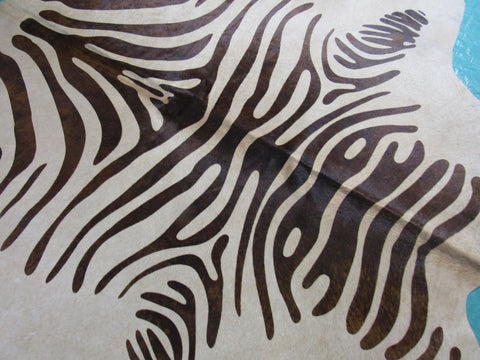 Zebra Print Cowhide Rug with Brown Stripes (1 hard to see patch, 1 scratch) Size: 7x6 1/4 feet M-1130