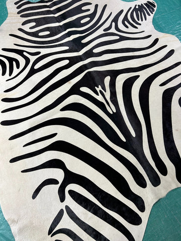 Zebra Cowhide Rug (neck has some subtle beige line/ 1 patch) Size: 6x5.2 feet M-1273