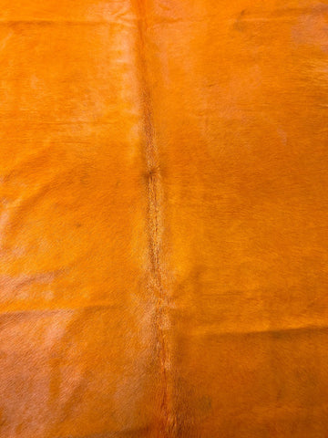 Huge Dyed Orange Cowhide Rug (a hard to see patch) Size: 8x7 feet M-1606