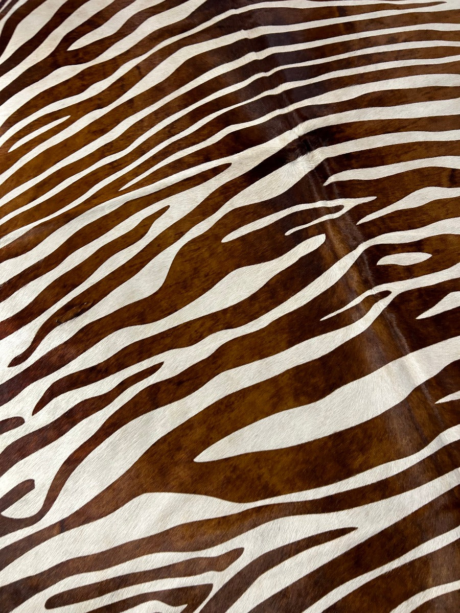 Zebra Print Cowhide Rug (brown stripes/2 small patches) Size: 7x6.2 feet O-392