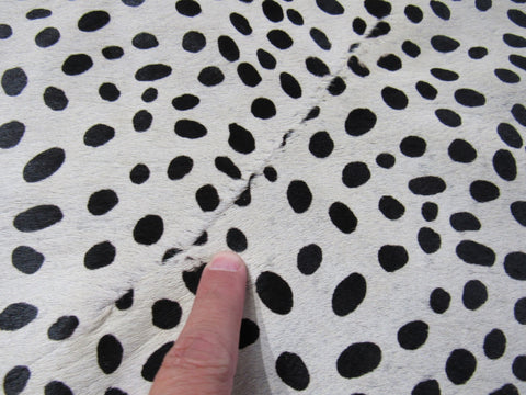 Cheetah Print Cowhide Rug (has a line down the middle/ 1 stitch) Size: 7x5.2 feet M-1210