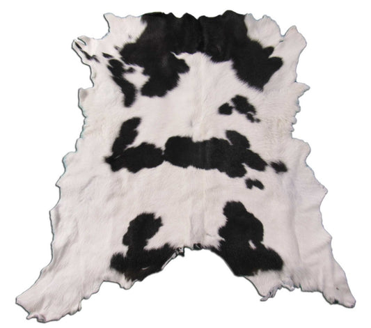 Peau de veau noire et blanche (poils assez longs) Taille : 40x39" K-216a