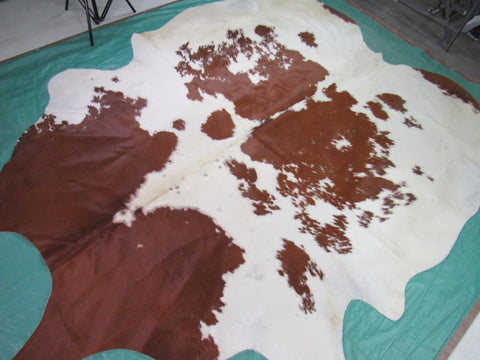 Brown & White Cowhide Rug Size: 8 1/4' X 7' Spotted Brown and White Cowhide Rug O-585