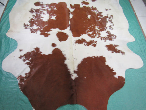 Brown & White Cowhide Rug Size: 8 1/4' X 7' Spotted Brown and White Cowhide Rug O-585